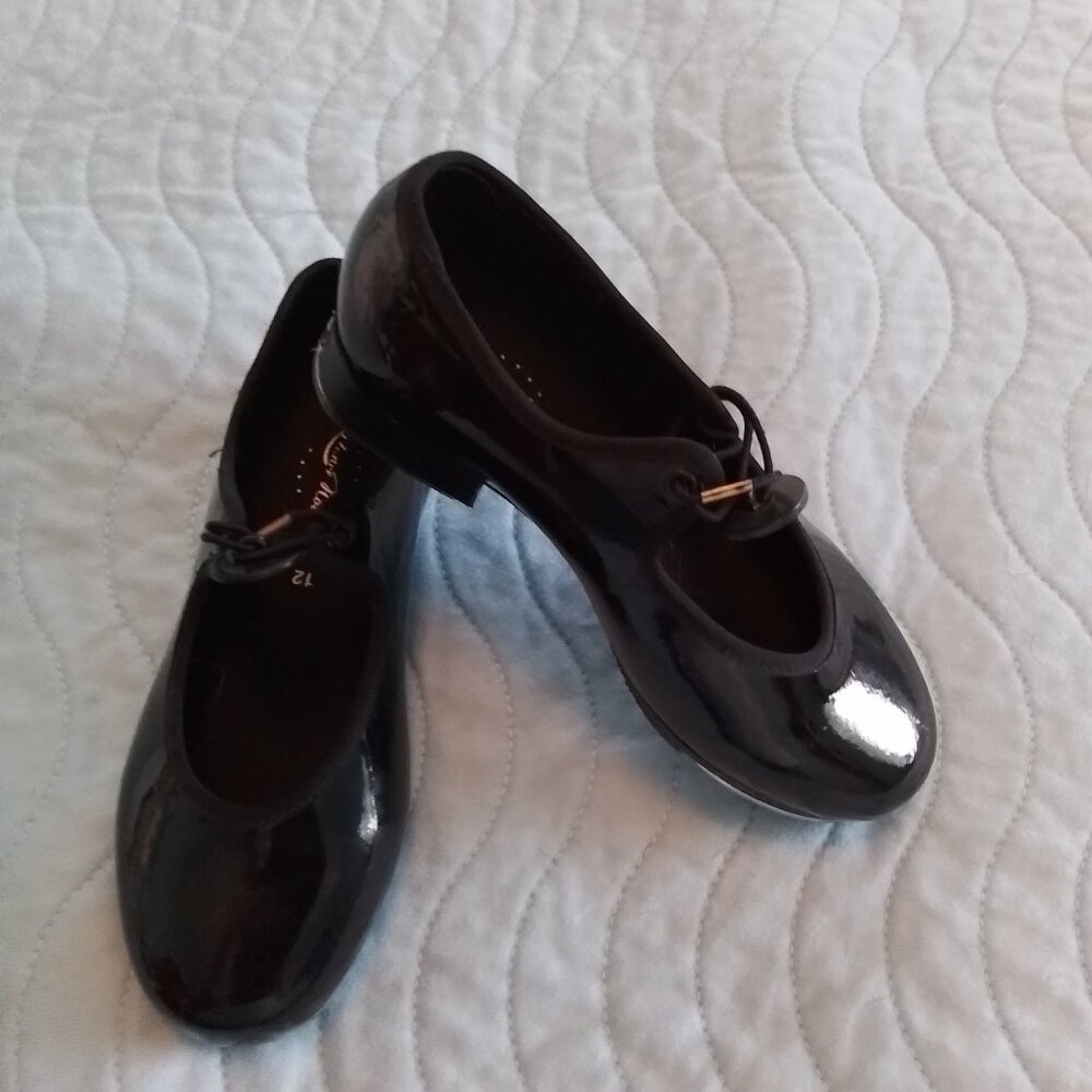 Girls dance now black tap shoes.  girls size 12